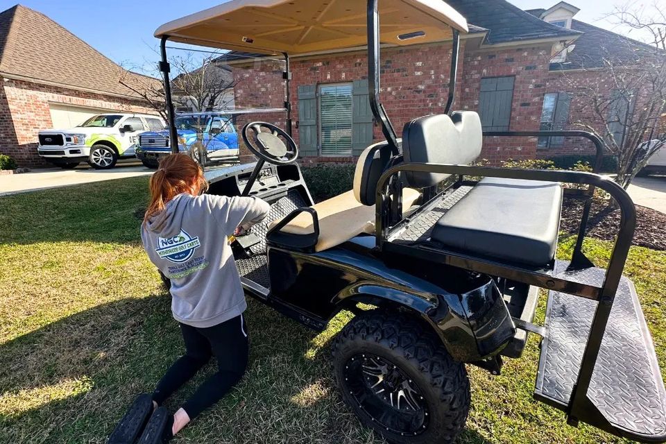 Christine performing mobile golf cart repair at a customer’s home in Madisonville, LA