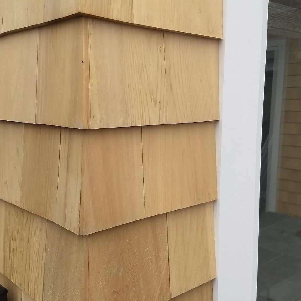 Cedar house siding job, A painted archway, done by Taurus Contracting Inc., of Suffolk County NY