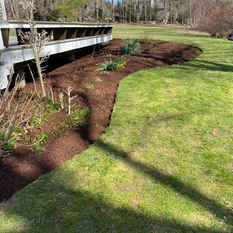 Sullivan mulch backyard deck after 1