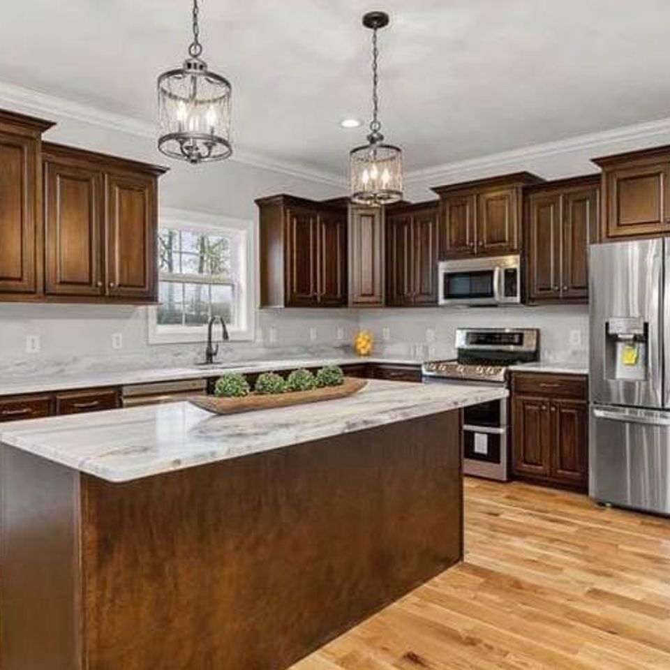 Custom kitchen remodel with quartz countertops and stainless steel appliances in Knoxville TN