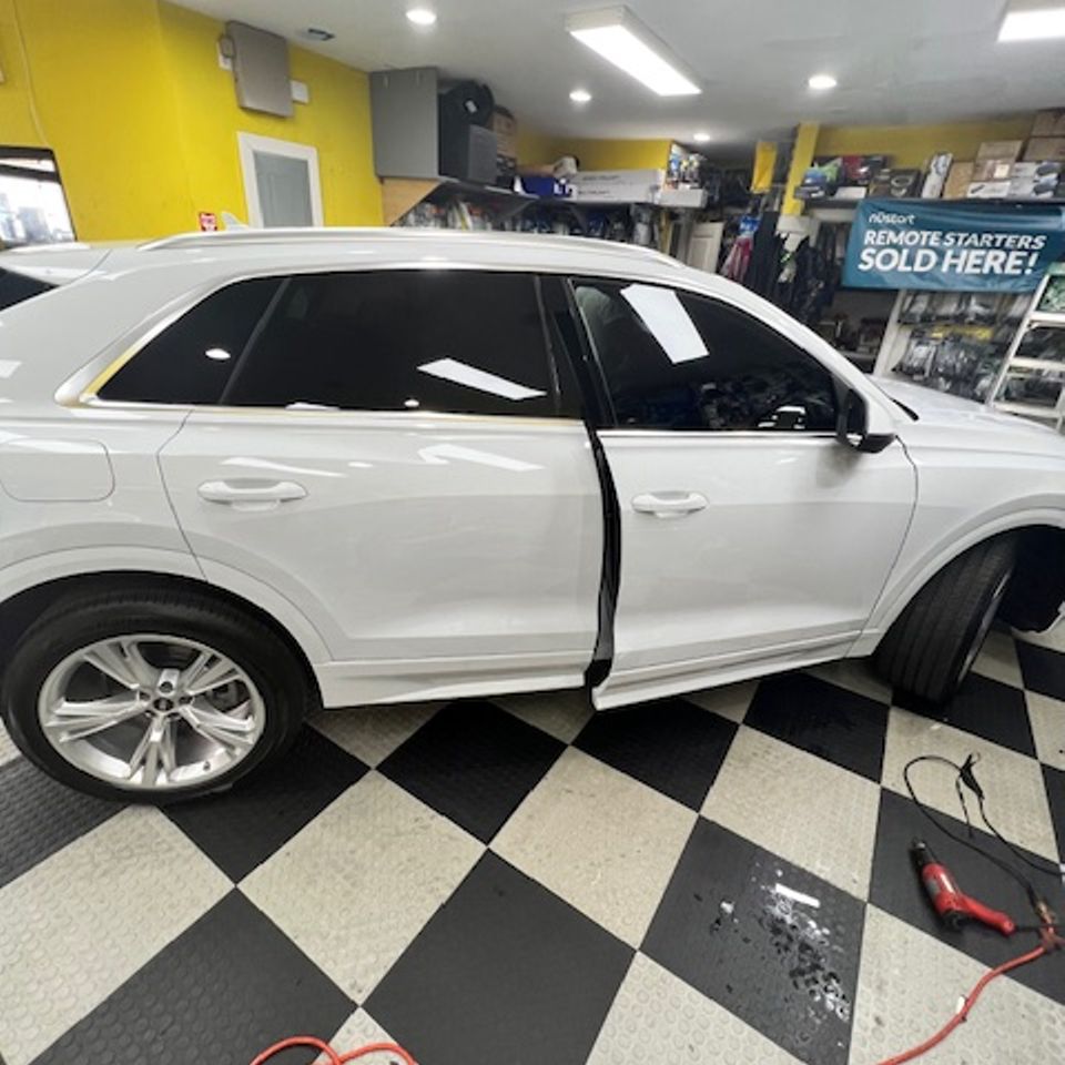 window tints on white Audi SUV