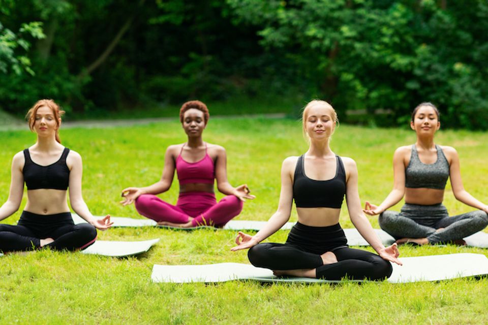 Outdoor yoga class group of diverse girls doing br 37lr7gr