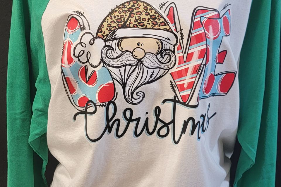 Example of a "Love Christmas" t-shirt using direct-to-film transfer (DTF) from SaRi's Creations.