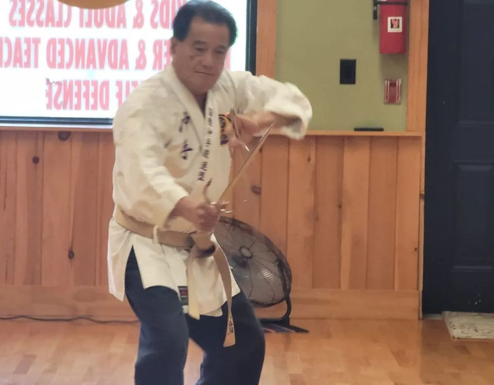 Hanshi Seiken Takamine doing a kata with the Sai weapon