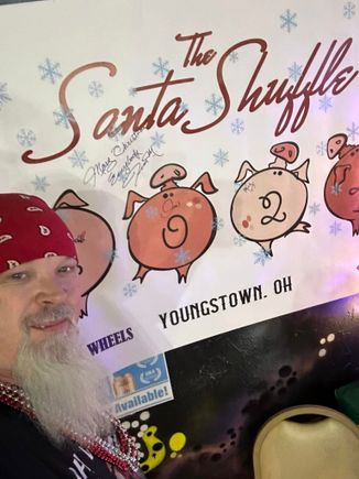 Santa Shuffle Youngstown, Ohio event banner decorated with holiday-themed graphics.
