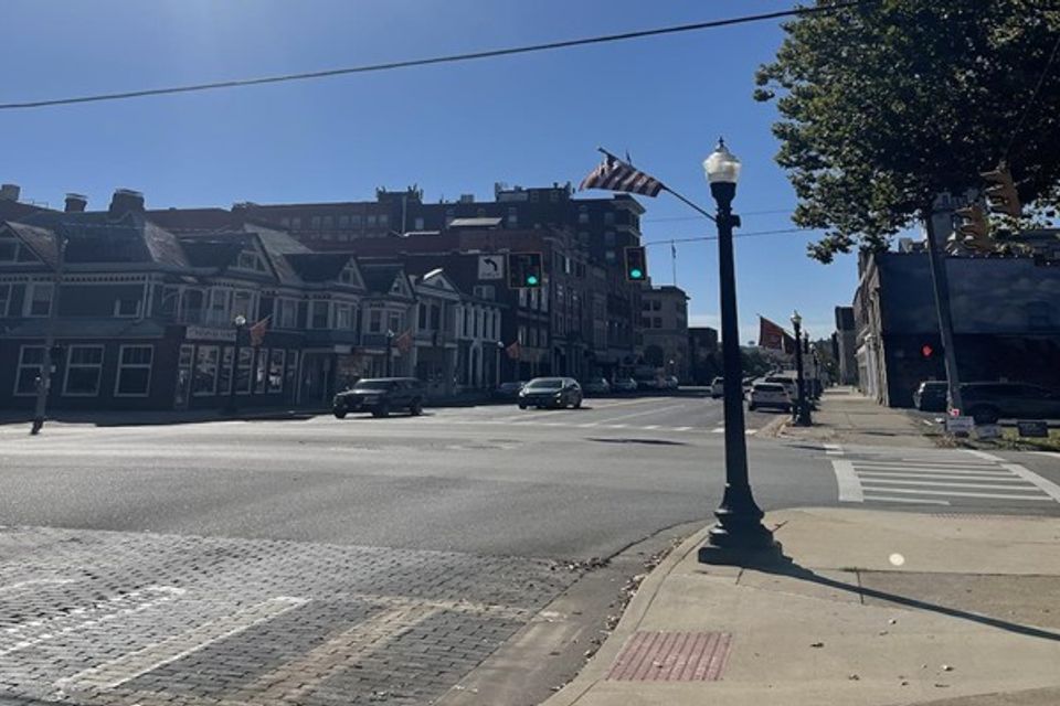 This photo was taken outside of the Mayor’s Office on Putnam Street. These light poles were an improvement made during the Mayor Schlicher’s tenure, showcasing a beautification project done during his time. 