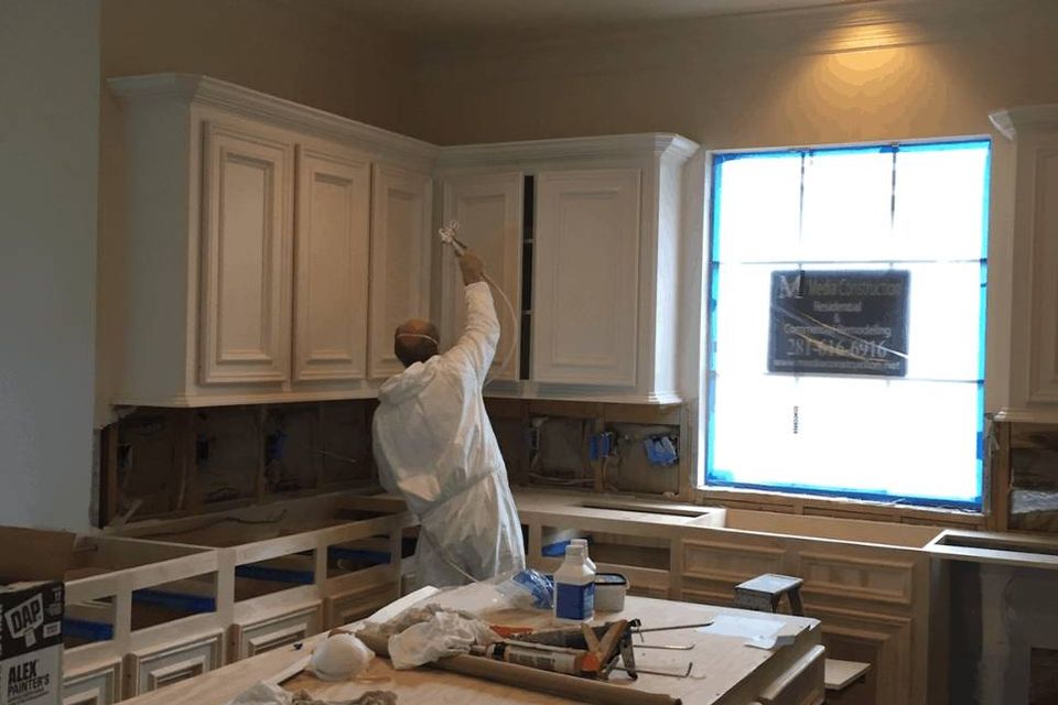 Custom kitchen cabinet installation during a remodeling project in Spring Texas
