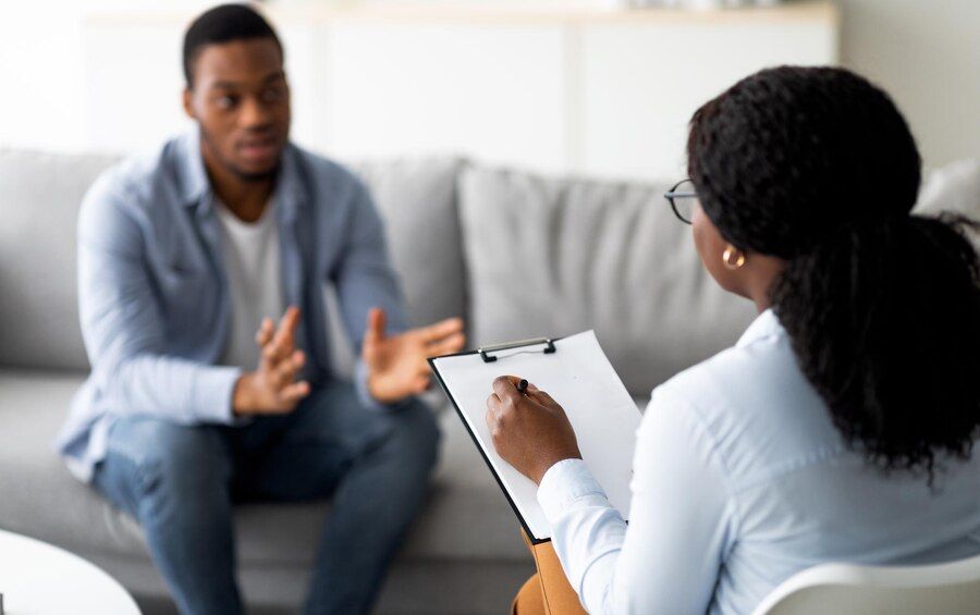 Psychological assistance millennial black man with depression having counseling session with 922936 65451