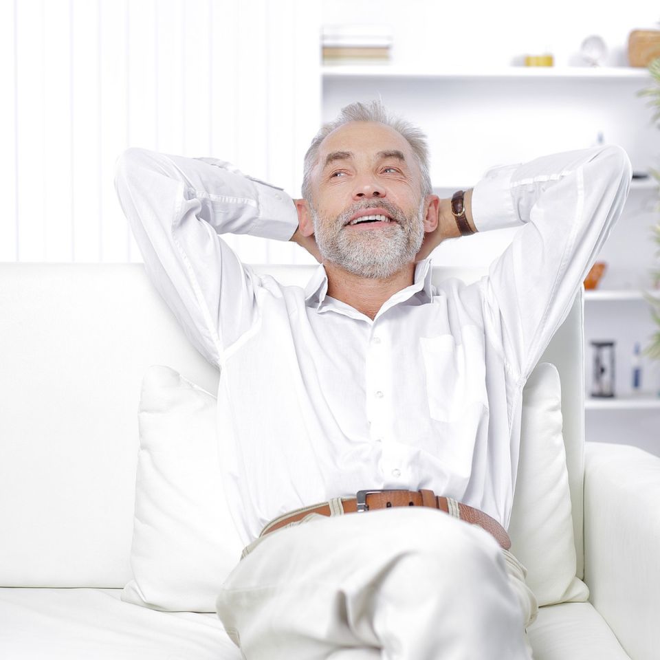 Dreaming businessman sitting his office photo with copy space