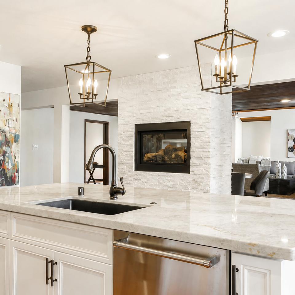 Modern kitchen remodeling with white cabinetry and stone countertops by Warehouse Interiors in Granite Bay, CA