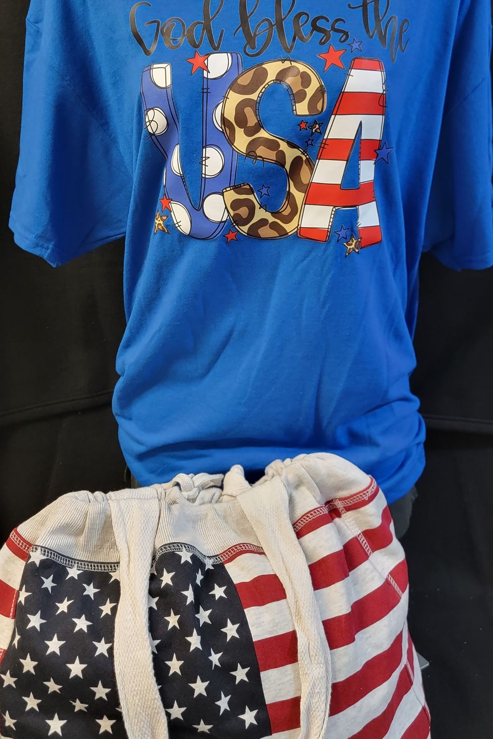 "DTF Direct-to-Film" example - "God Bless the USA" on blue t-shirt