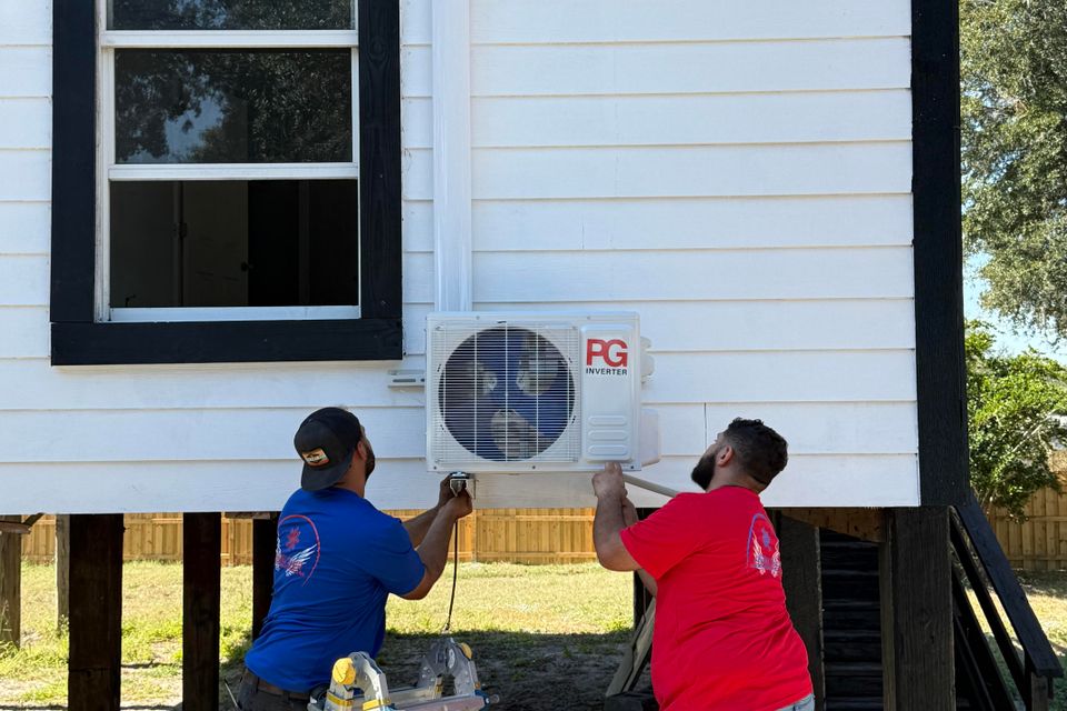 Split unit air conditioner system with indoor air handler and outdoor compressor. 