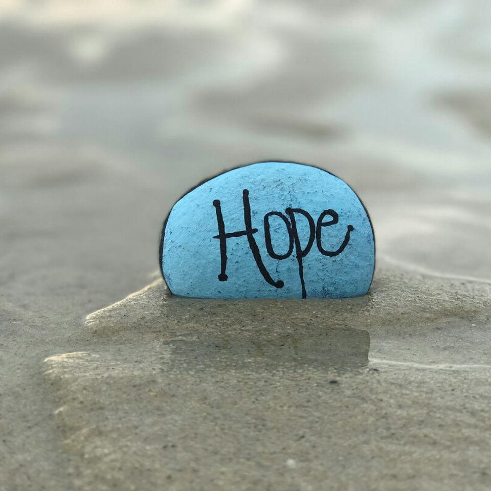 Rock with hope written on it. 