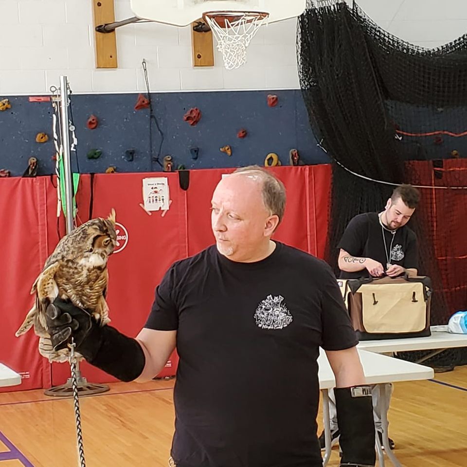 Jim holding an owl