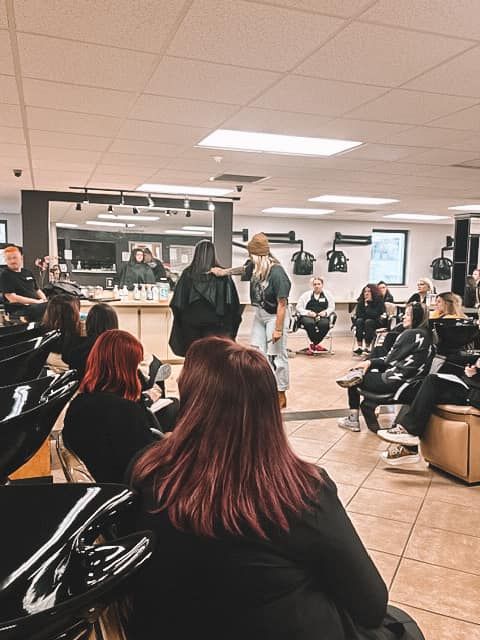 Cosmetology students learning in classroom at beauty school in Johnson City TN