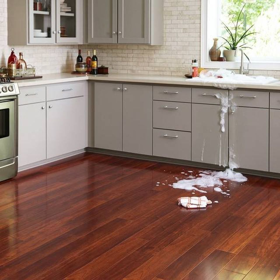 100344605 albion0718 aquagaurd cherry high gloss water resistant laminate 100203090 fossil brushed limestone mosaic 100287887 serene ivory tear drop limestone mosaic 100224369 countertop 100035674 grout 100287879 pencil spill kitchen room