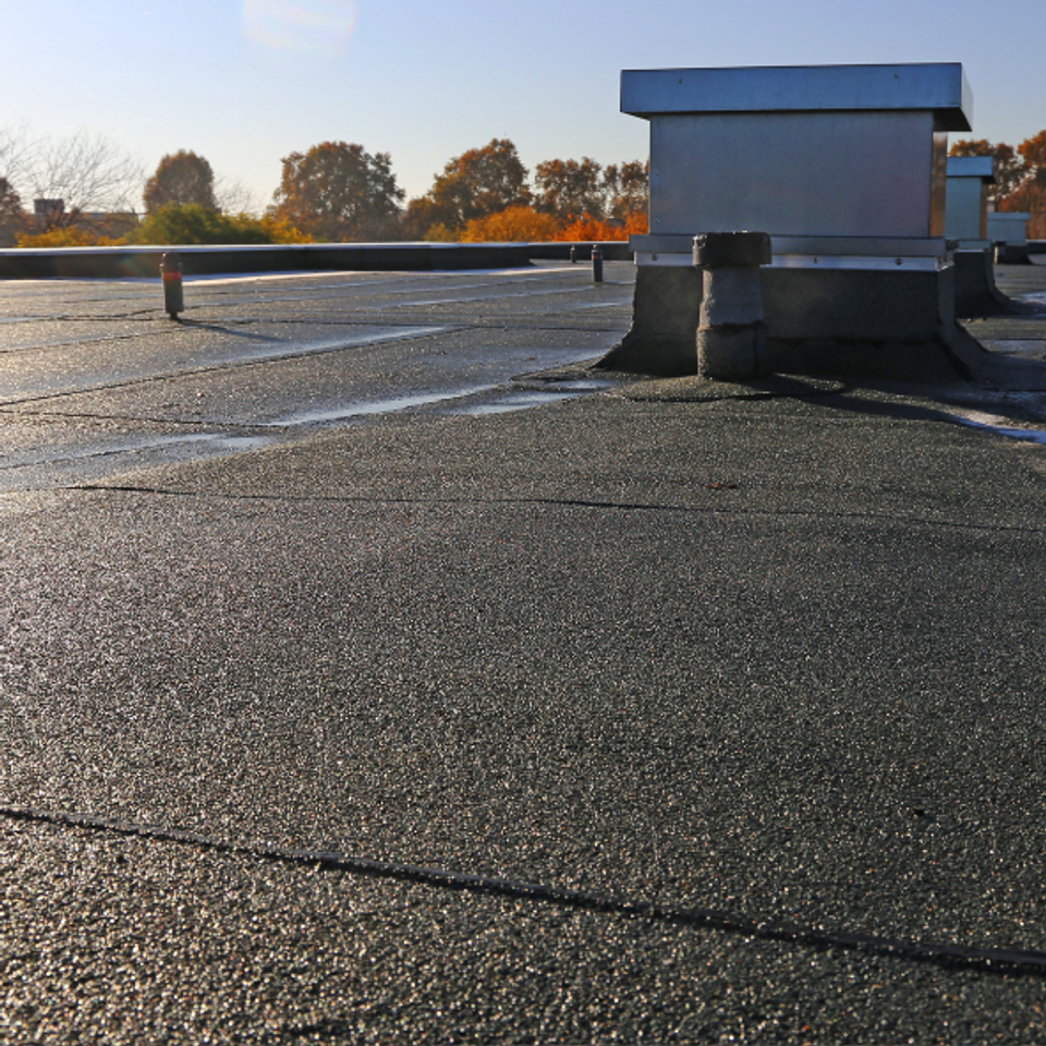 Low-slope commercial roofing system designed for durability and long-term weather protection.