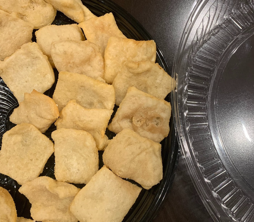 Tray of golden fried snack bites.