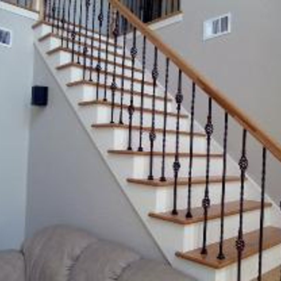 Roper hardwood floors   tulsa  ok   stairs and balusters   new wooden handrail  iron balusters  stained wood treads  painted risers 220170511 11947 rv5bzj
