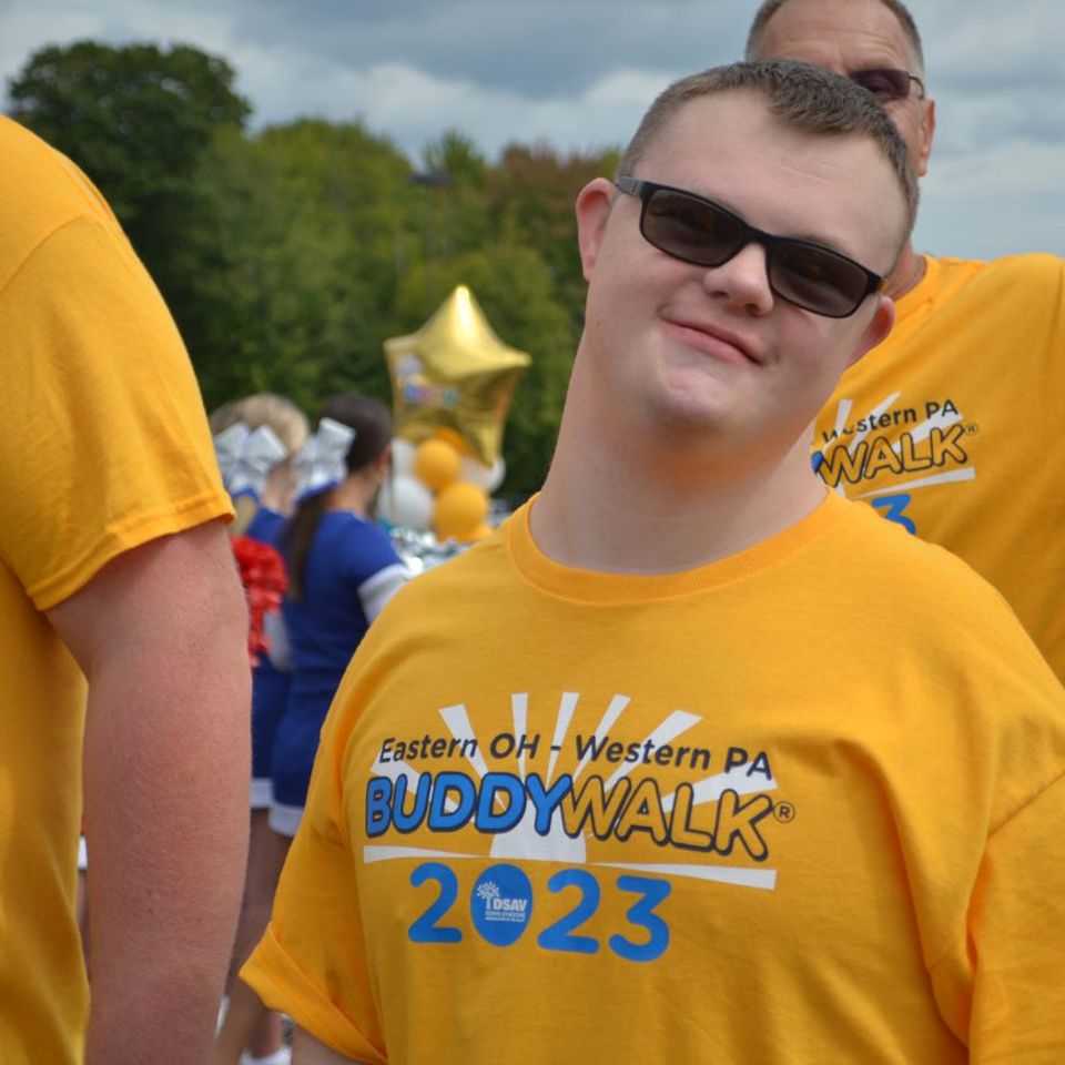 Participant wearing a 2023 Buddy Walk shirt at the Down Syndrome Association of the Valley event.