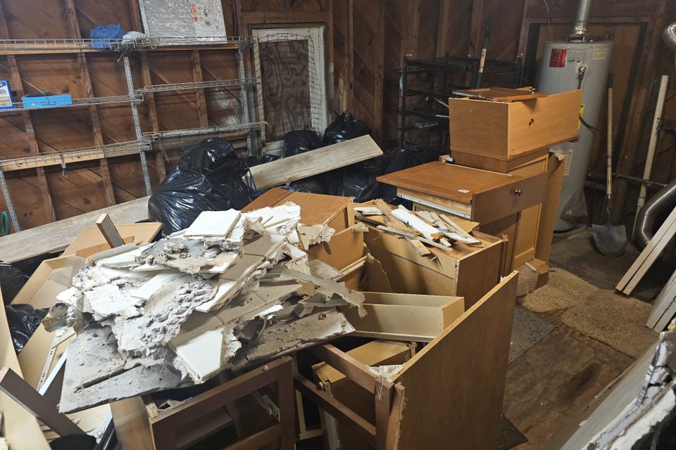 A shed/garage filled with junk.