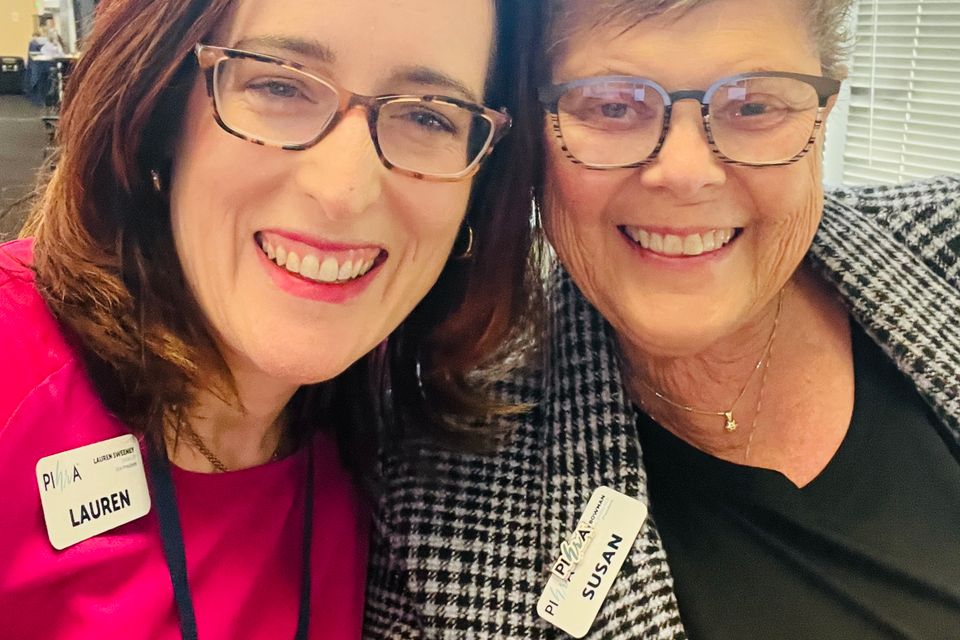Two women smiling