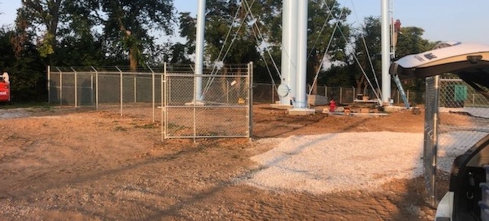 Security fence around water tower