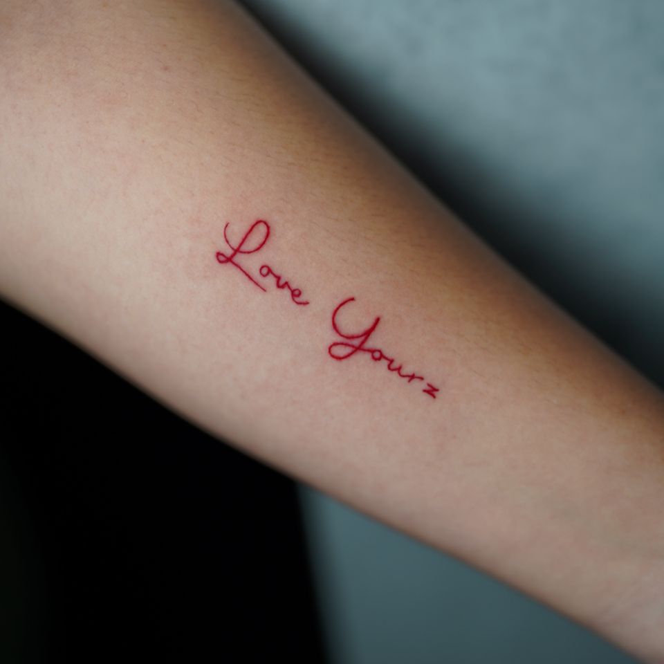 Image of a tattoo with a meaningful message - Love Your z