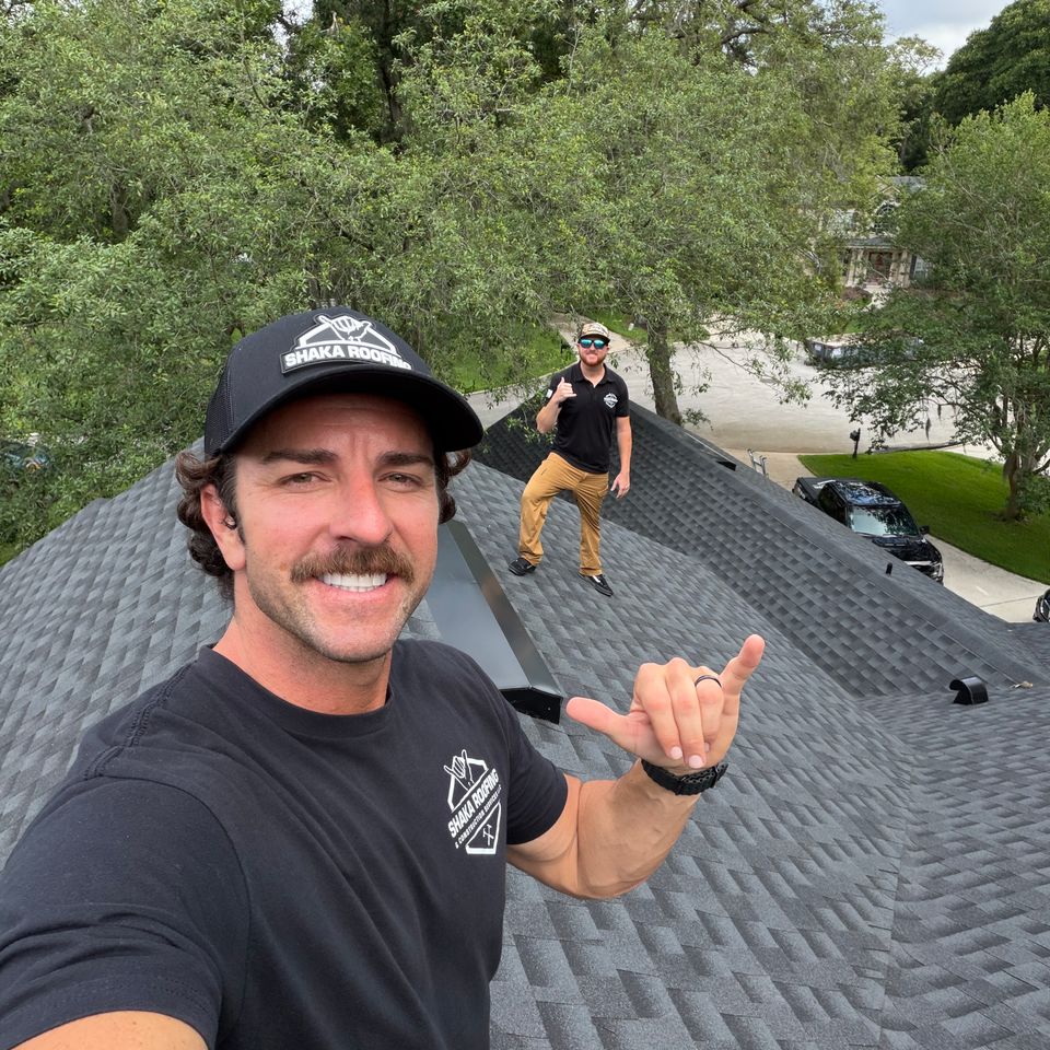 Shaka roofing Owner Sean along side Aaron