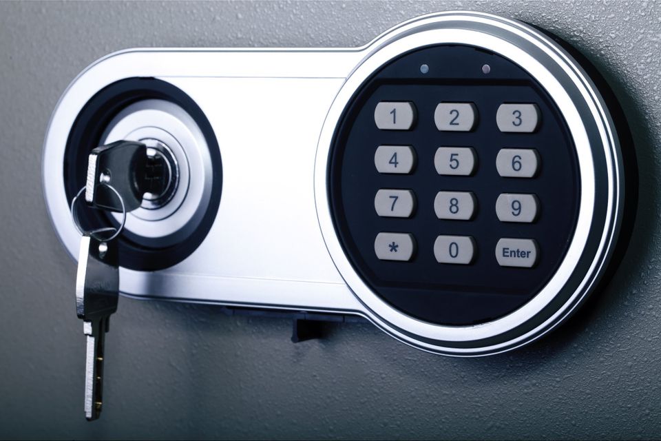 Lock of a safe with its key