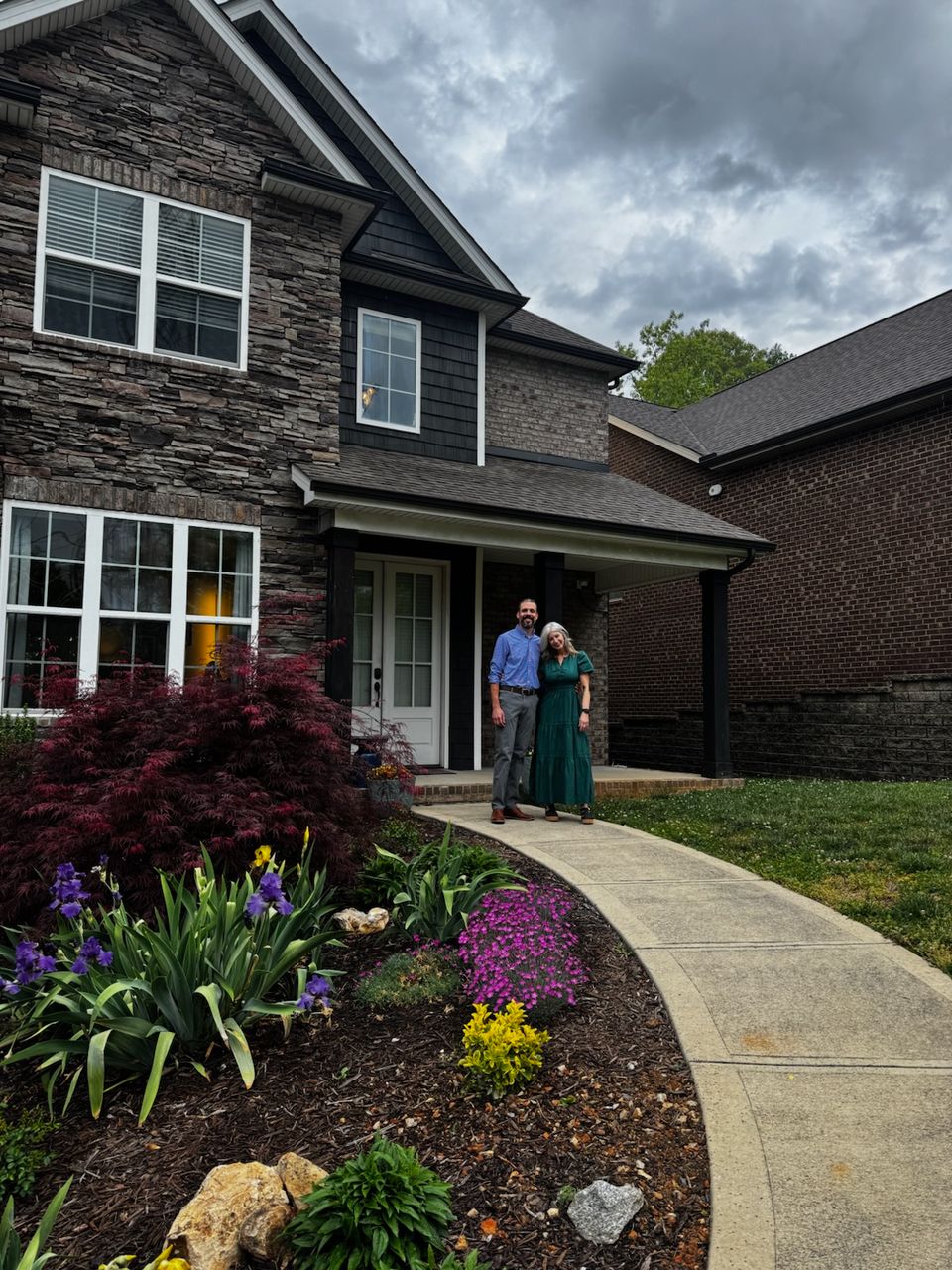 A couple happily purchasing their new home, with the peace of mind that comes from Stewart & Associates Insurance. Protect your home and belongings with personalized property insurance coverage.
