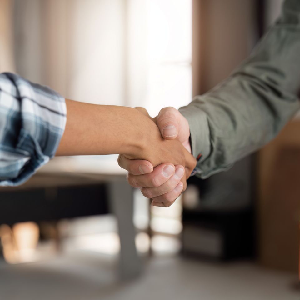 Close up hand of young engineer handshake with par 2023 11 27 04 56 45 utc