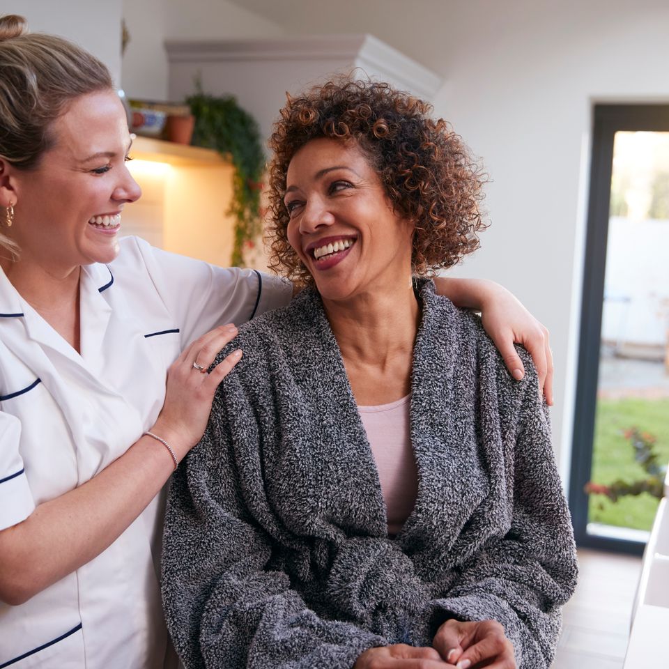 Mature woman in dressing gown talking with female 2023 11 27 05 15 11 utc
