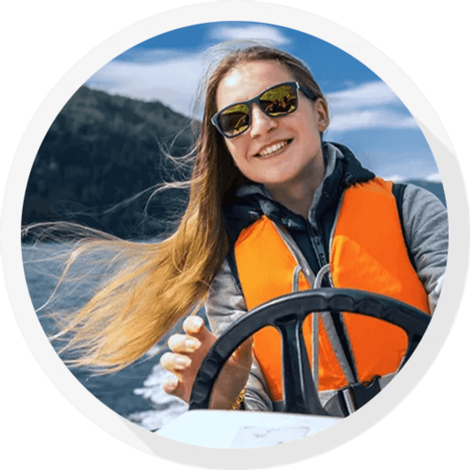 Woman driving boat