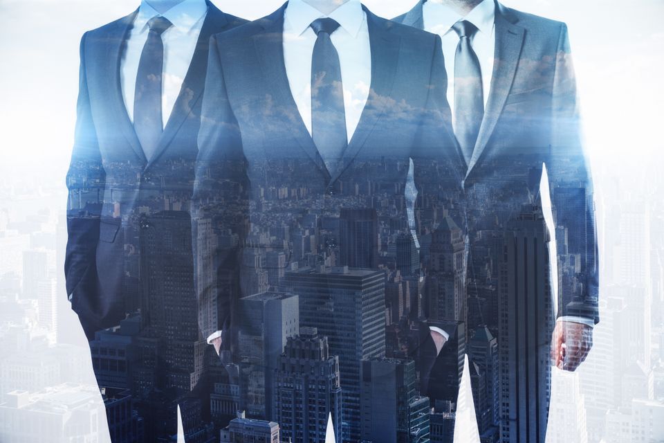 Businessmen on abstract city background meeting a 2026 01 11 08 37 15 utc