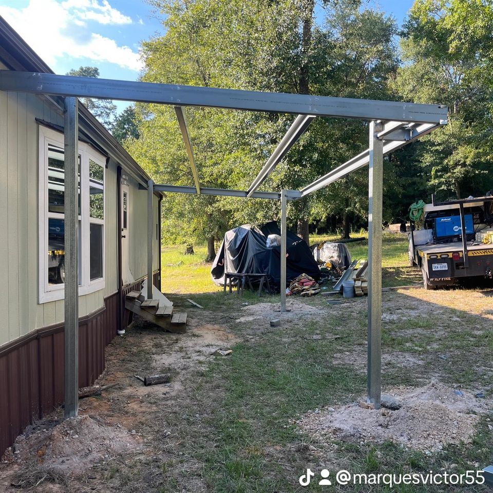 Metal roof frame and steel support structure under construction for covered porch in Houston by Marquez Welding