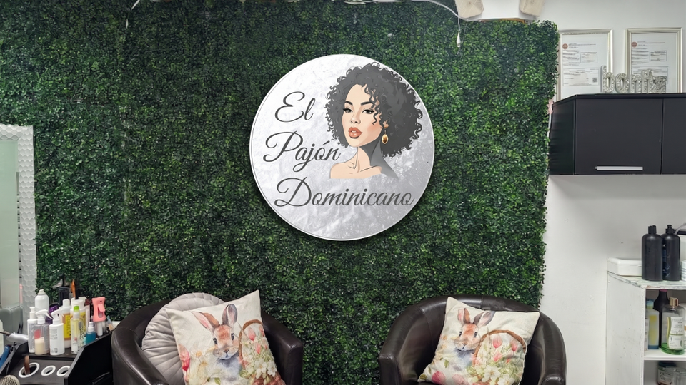Salon space with logo on the wall (small)