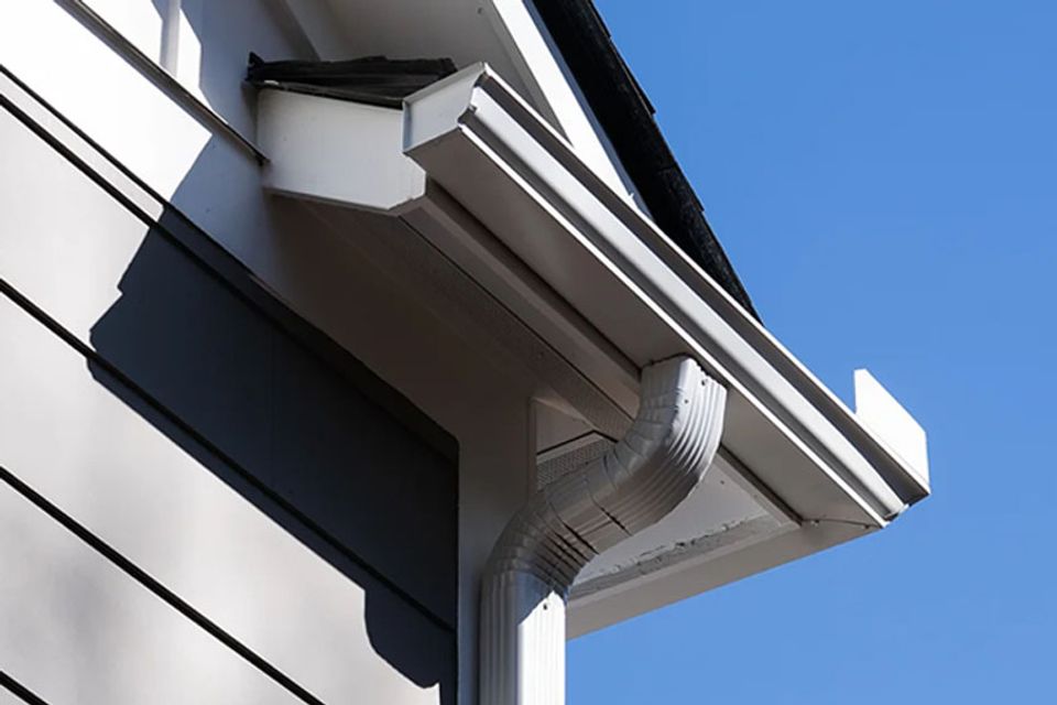 Clean downspout home exterior