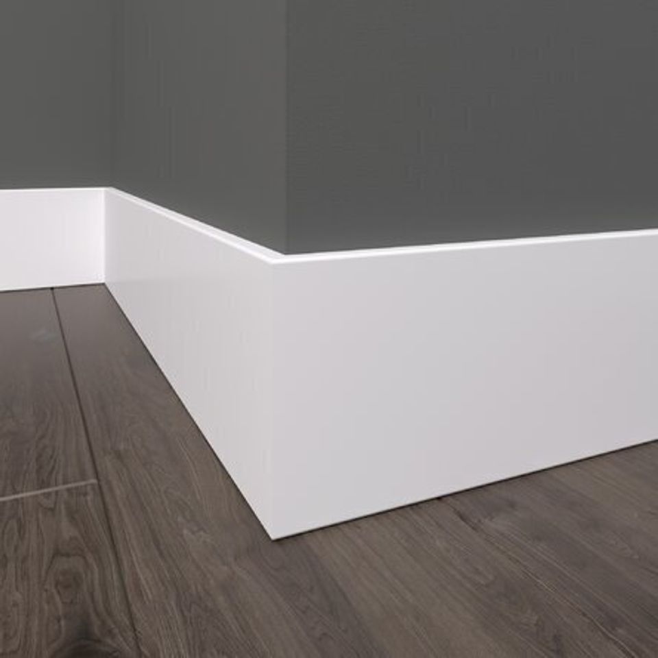 Engineered wood 0.87" thick x 5.25" wide x 96" length wall base in white