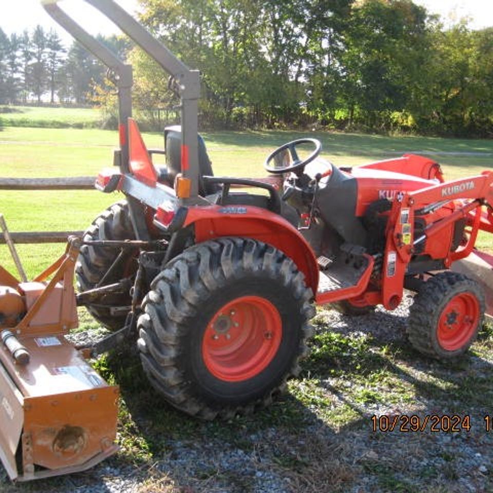Kubota front end loader with tiller 15 000.