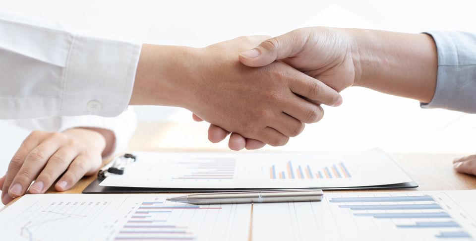 Women shaking hands
