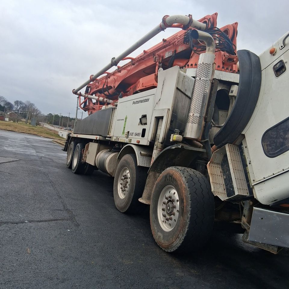Putzmeister concrete pump truck during diesel engine service call in Arab Alabama