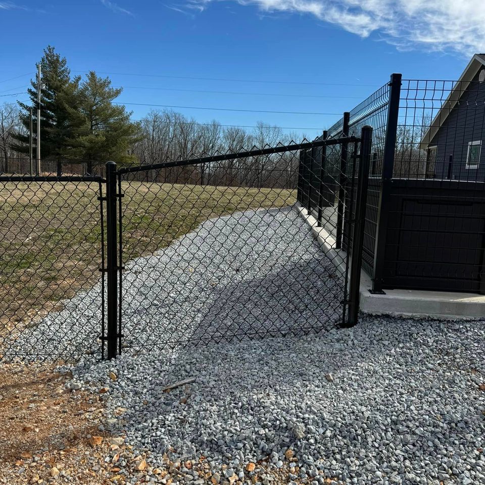 custom deck railing and black chain link fence