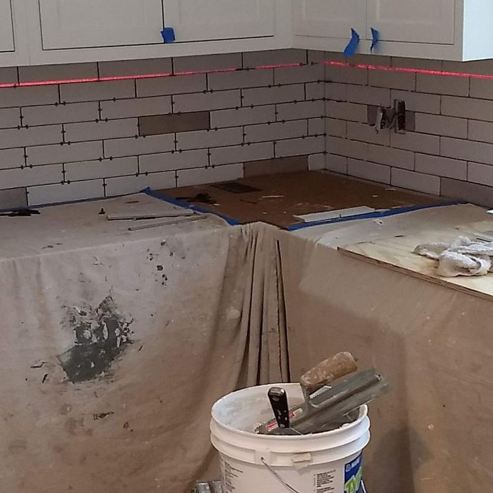 Kitchen backsplash tile installation in progress by general contractor in Suffolk County NY