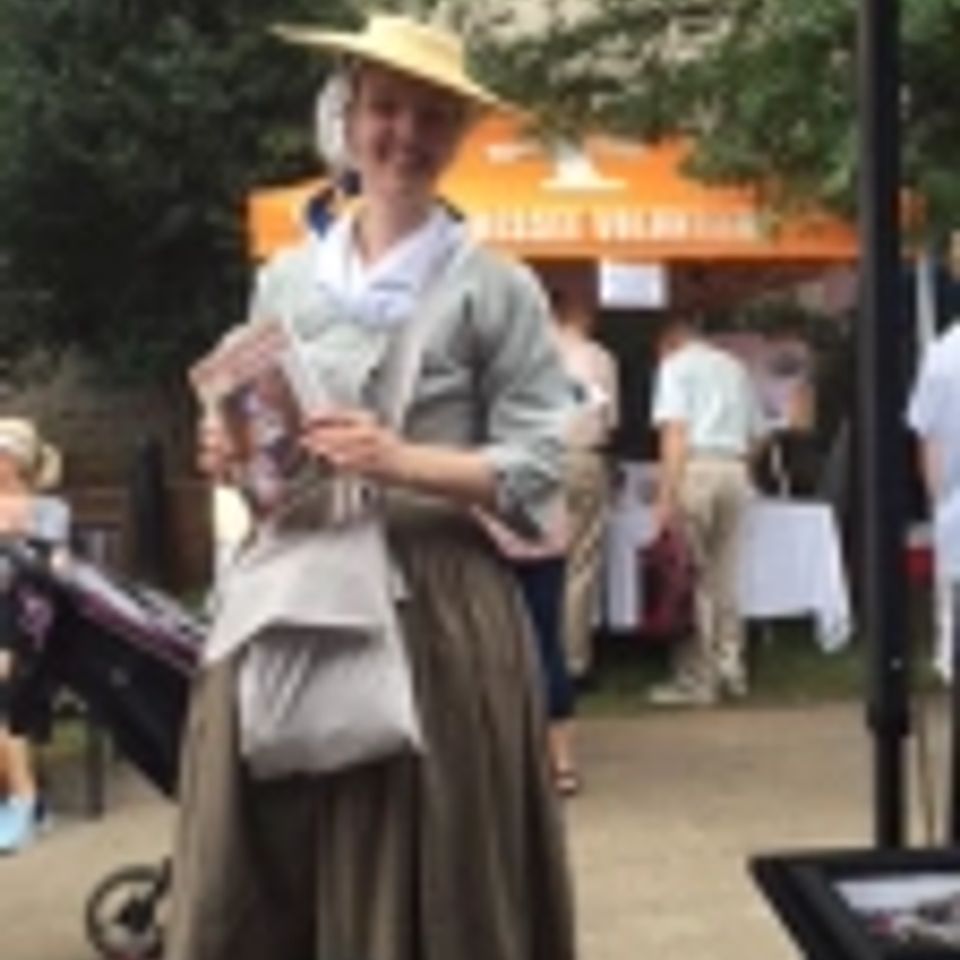 Reader in period dress