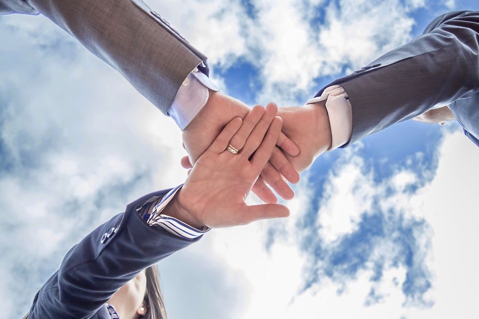 Business team showing unity with hands together 2025 03 13 09 32 25 utc