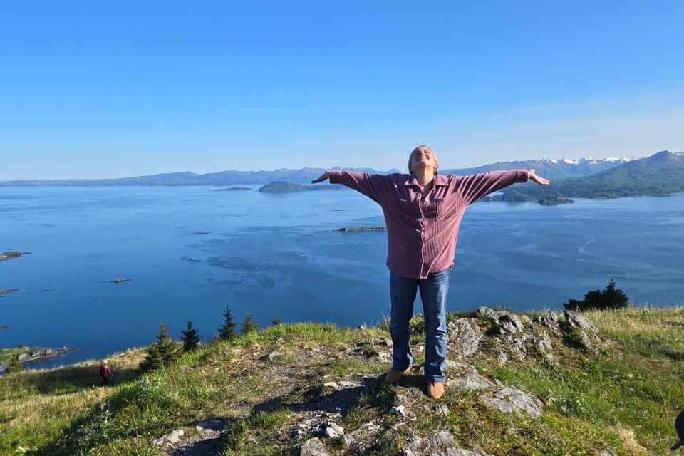 Happy in front of beautiful view