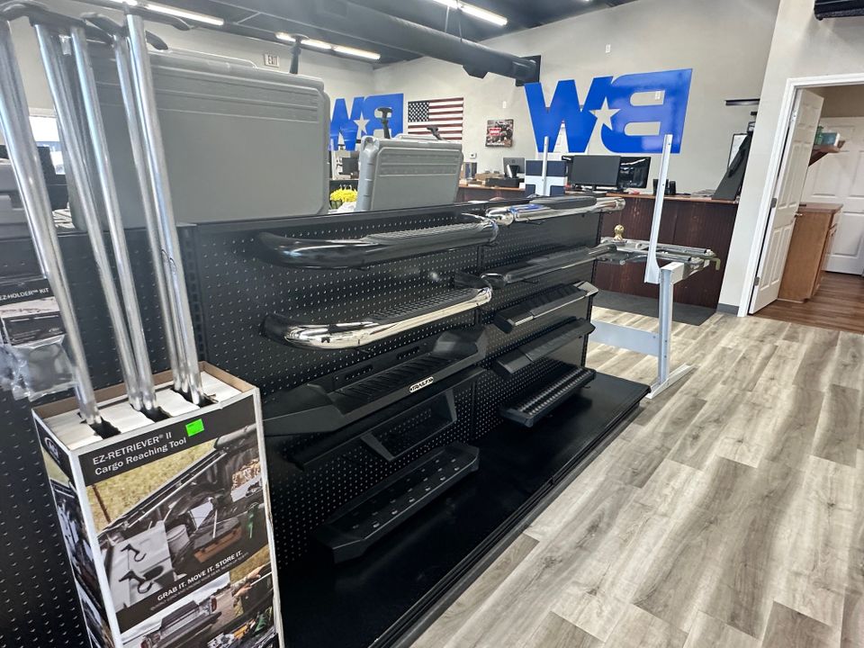 Truck accessories showroom featuring bed racks and storage solutions at Patriot Truck Accessories in Hot Springs Arkansas