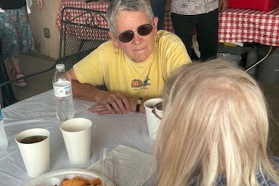 Debbie walls with jim cash in background