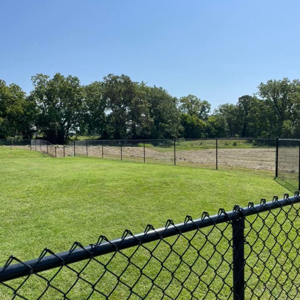 black chain link fence slope